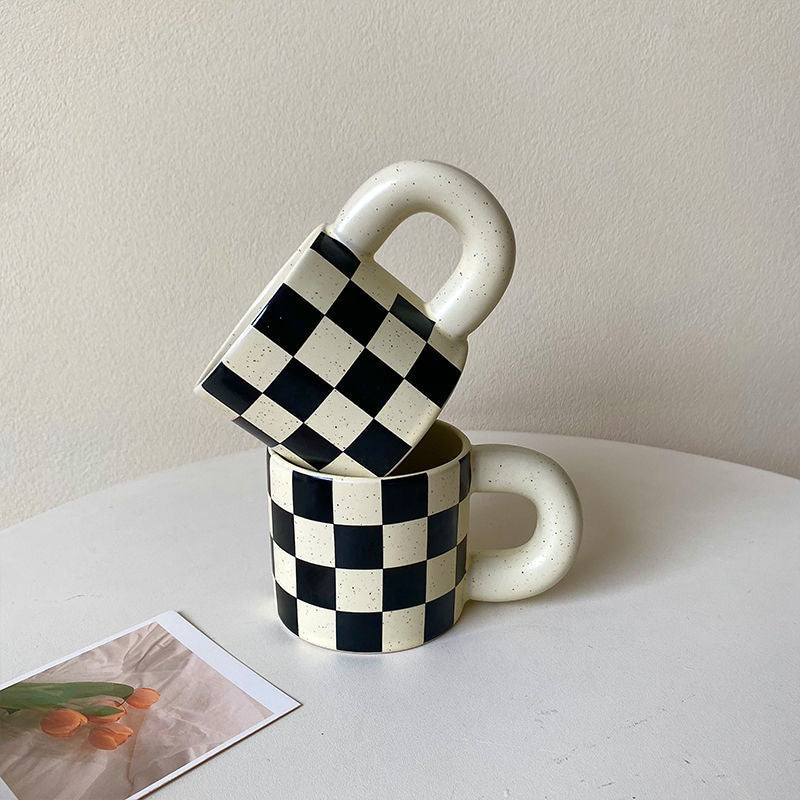 Black and white checkered coffee mug