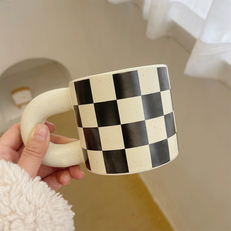 Black and white checkered coffee mug