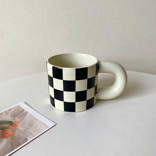 Black and white checkered coffee mug