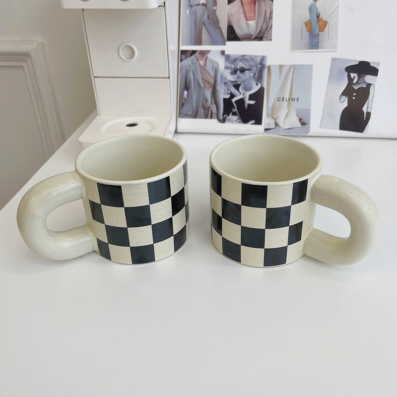 Black and white checkered coffee mug