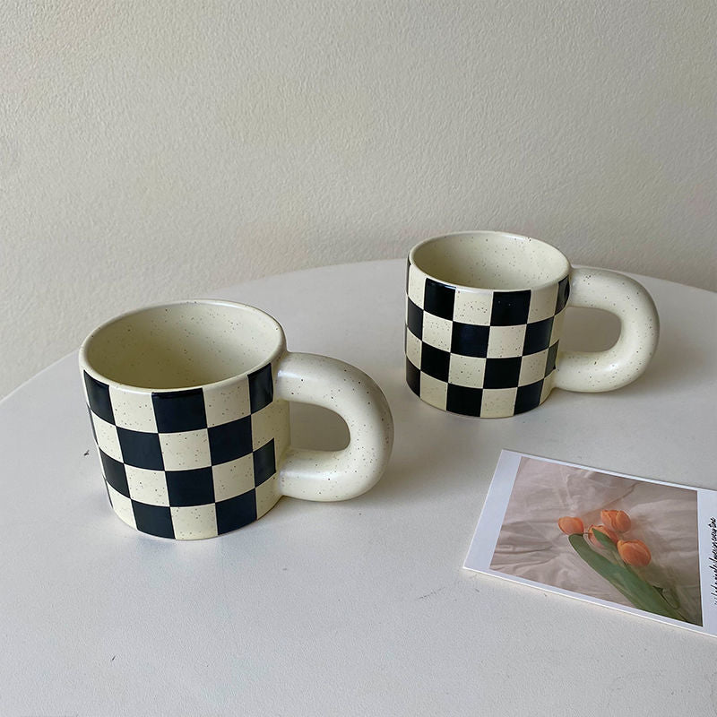 Black and white checkered coffee mug